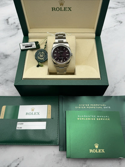 Rolex Oyster Perpetual - 114200 -  34mm - RARE Red Grape Dial - £5250 On Collect9